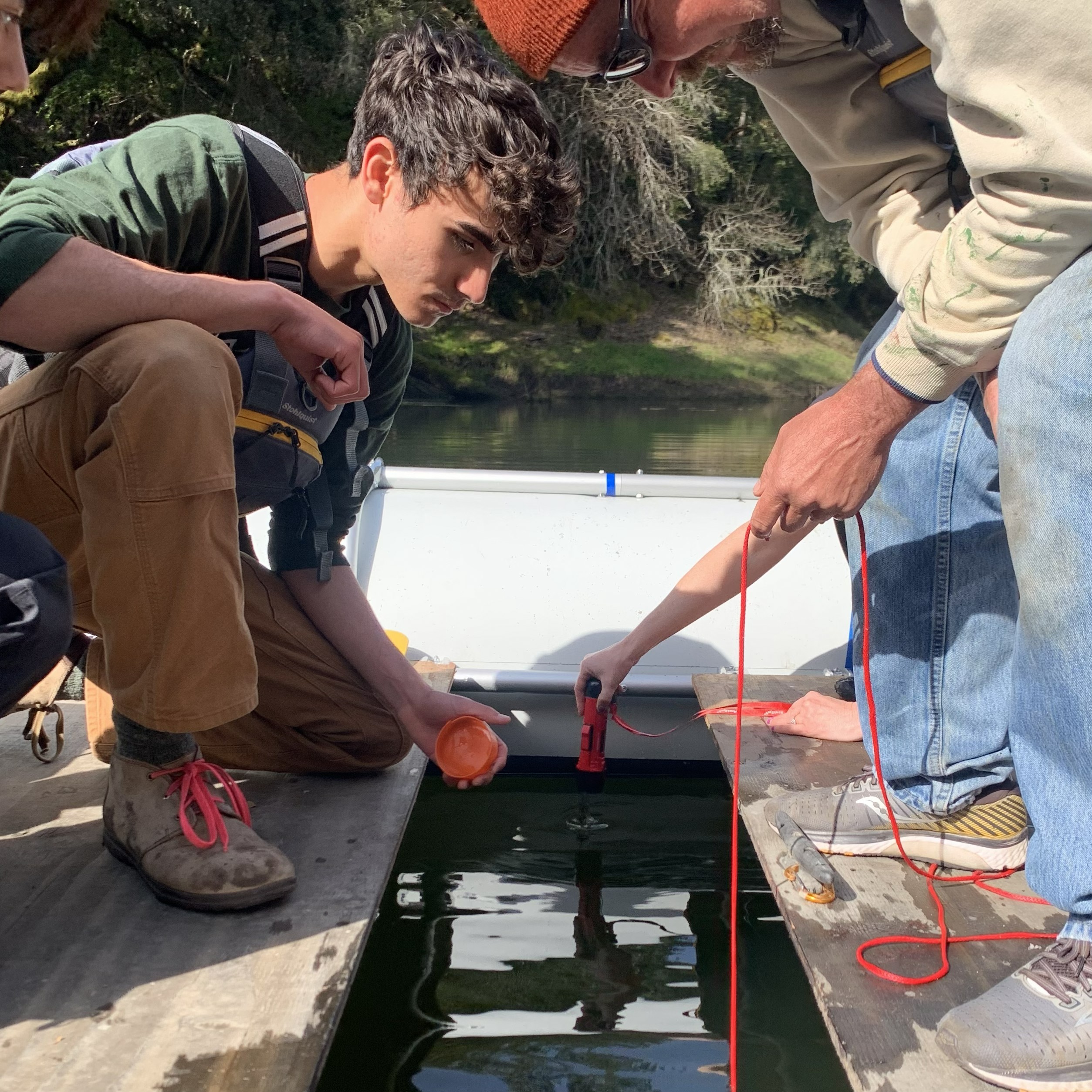 Liam working in an environmental field setting